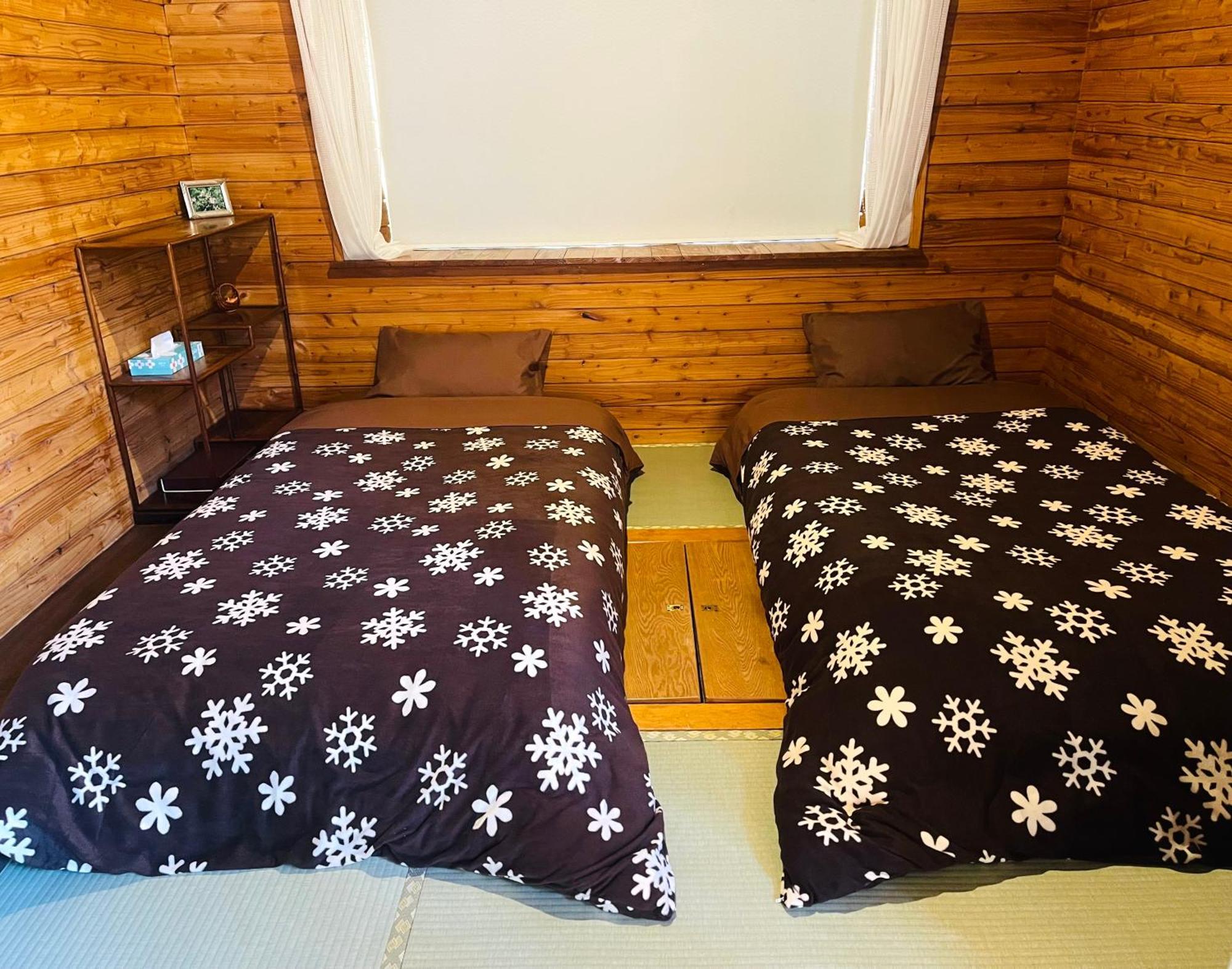 民泊joyful天然温泉付きログハウス Hébergement de vacances
